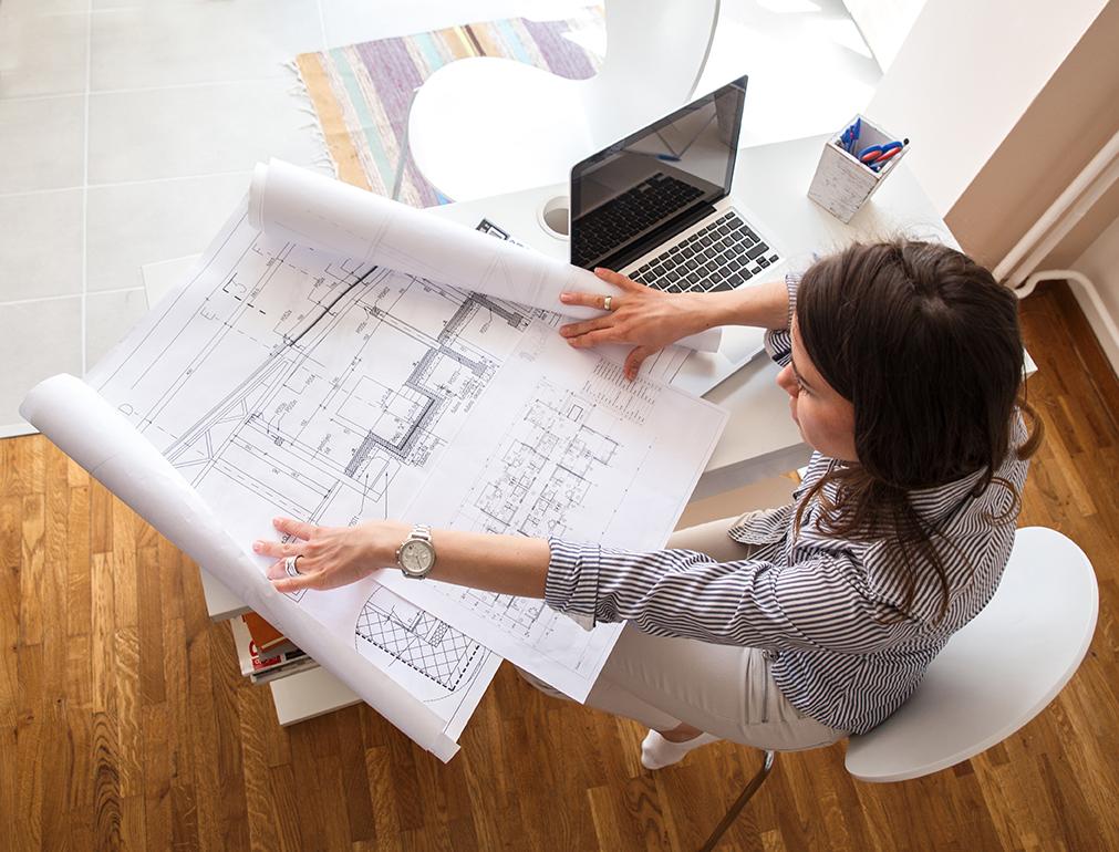 consentus architect looking at the plans